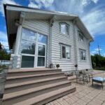 Покраска дома из оцилиндрованного бревна 24 диаметра (Кострома)